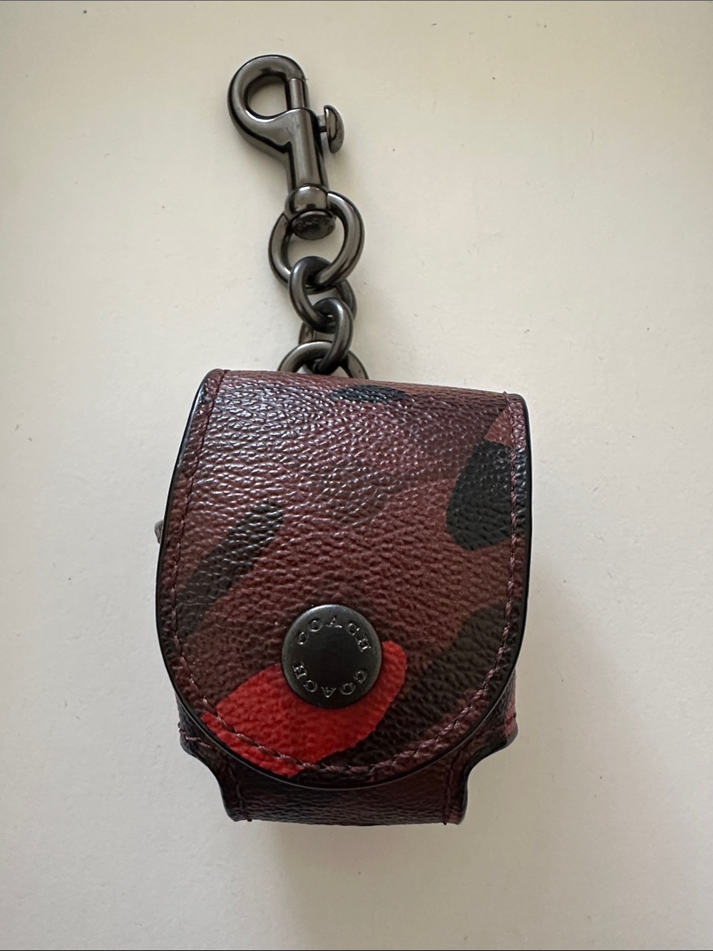 Coach Leather Red Camouflage Pebbled Wireless Earbud Case with Gunmetal Clip